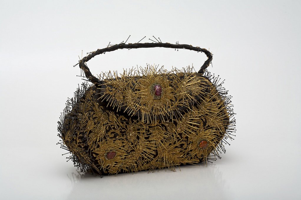 Dangerous Beauty,embroidered handbag, brass pins, 
and steel pins with heat patina