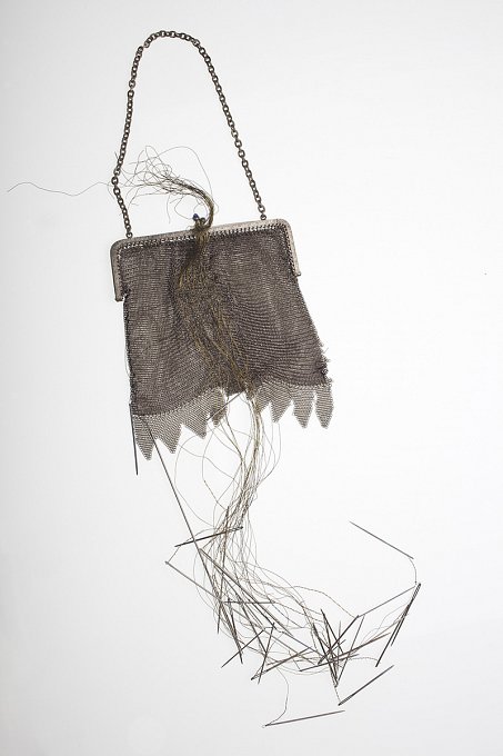 Who's That Hanging On Your Arm?,metal mesh evening bag, brass and steel wire,
steel needles, enamel