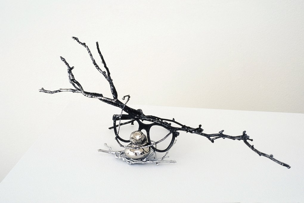 Borrowed Garments Never Fit Well,cast stainless steel duck, chromed twig and glasses, paint